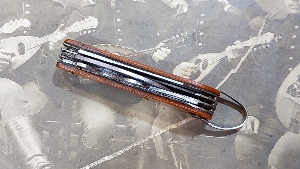 Small pocket knife-knife and fork.