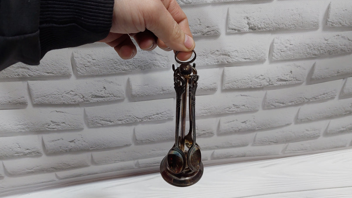 Vintage 4 spoons on a stand, silver plated. New spoons.