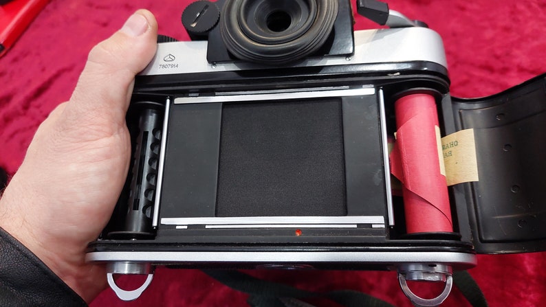A rare vintage Kyiv-6S TTL camera is a medium format single-lens reflex camera with a Vega-12B 2.8/90 lens.