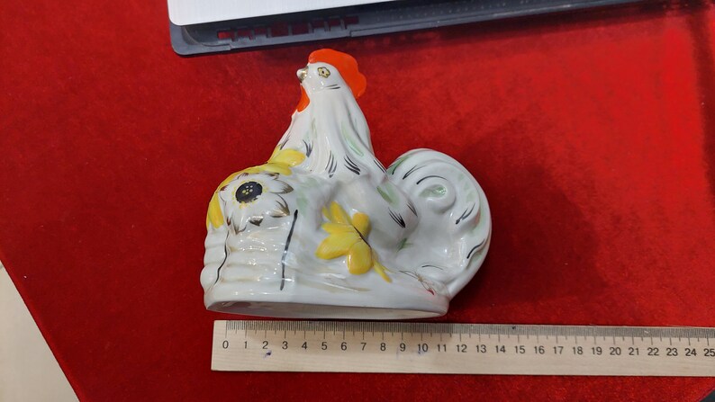 Ukrainian rooster with sunflowers. Porcelain figurine