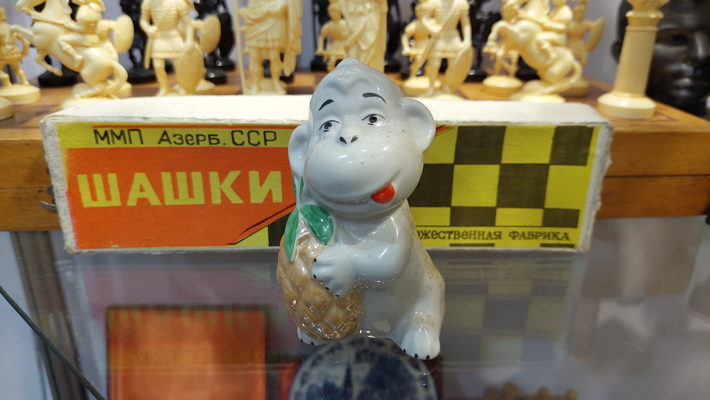 Porcelain monkey with pineapple made in Ukraine, USSR