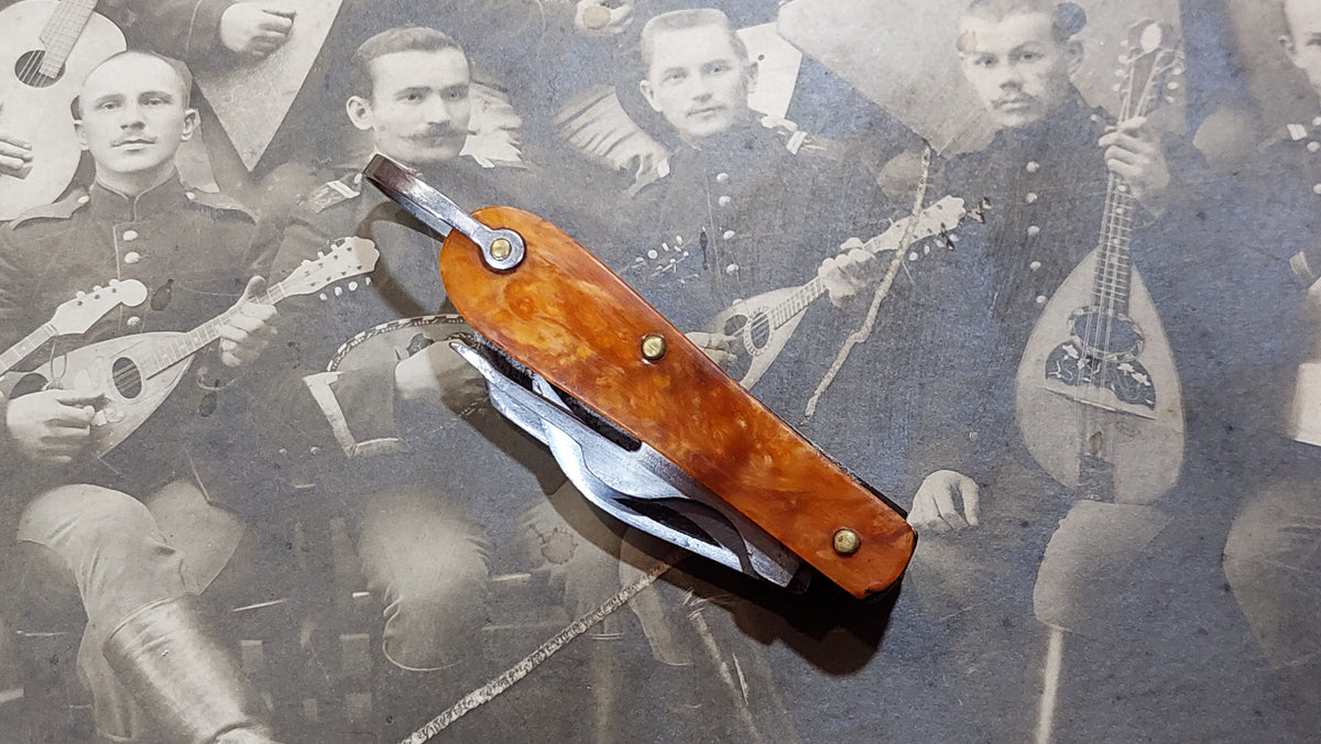 Small pocket knife-knife and fork.