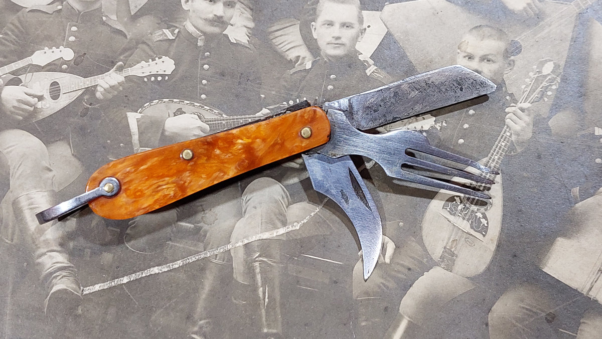 Small pocket knife-knife and fork.