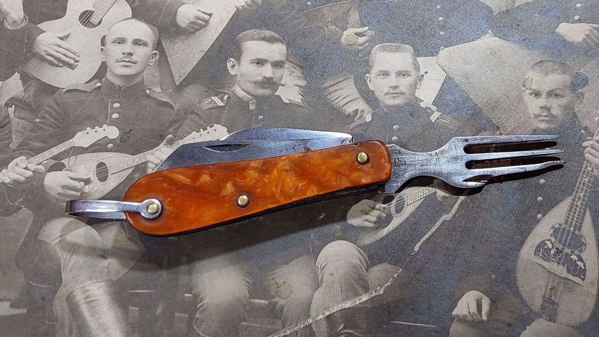 Small pocket knife-knife and fork.