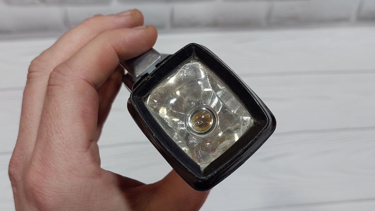 FLASHLIGHT. Vintage mechanical ZIP flashlight, electrodynamic carbolite flashlight.