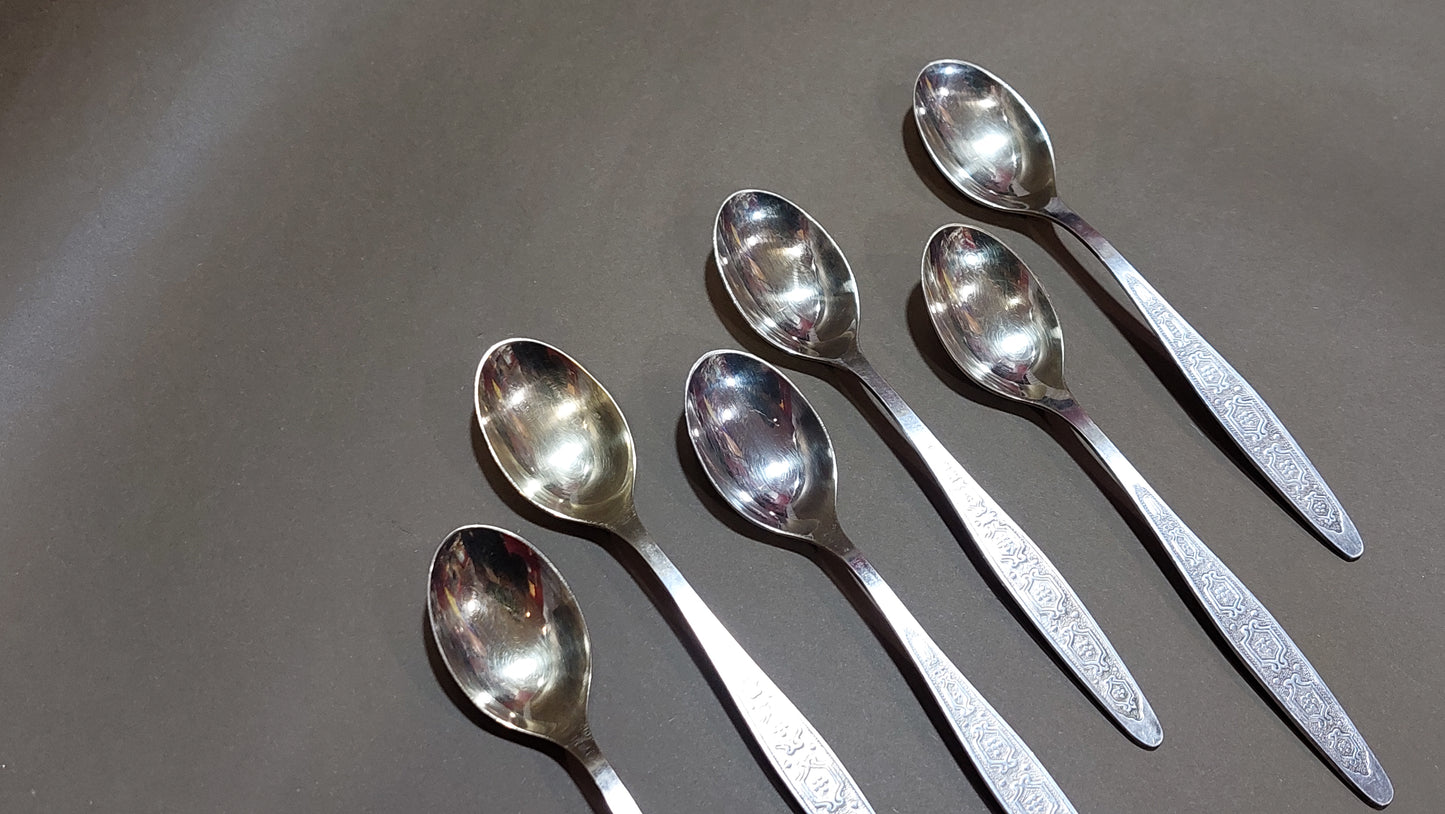 Vintage nickel silver teaspoons.