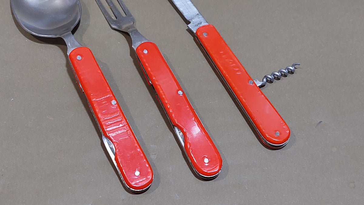 vintage travel set compass spoon fork bottle opener .
