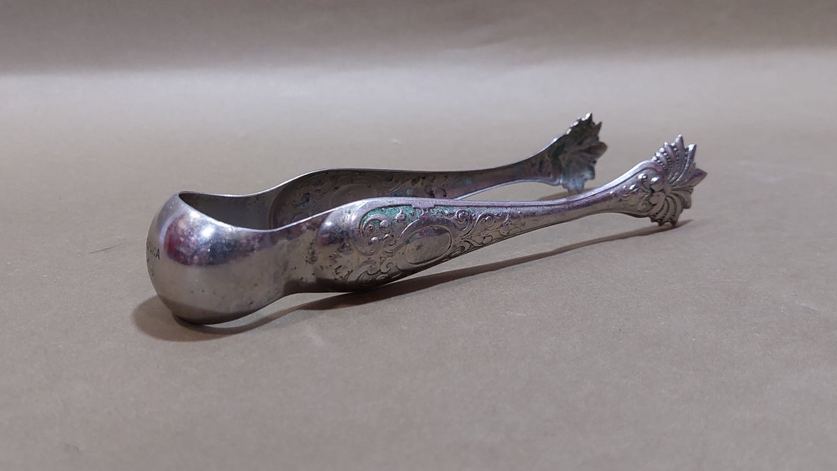 ALPACA sugar tongs.