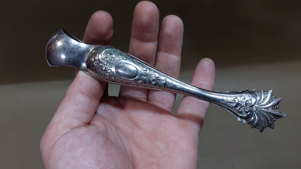 ALPACA sugar tongs.