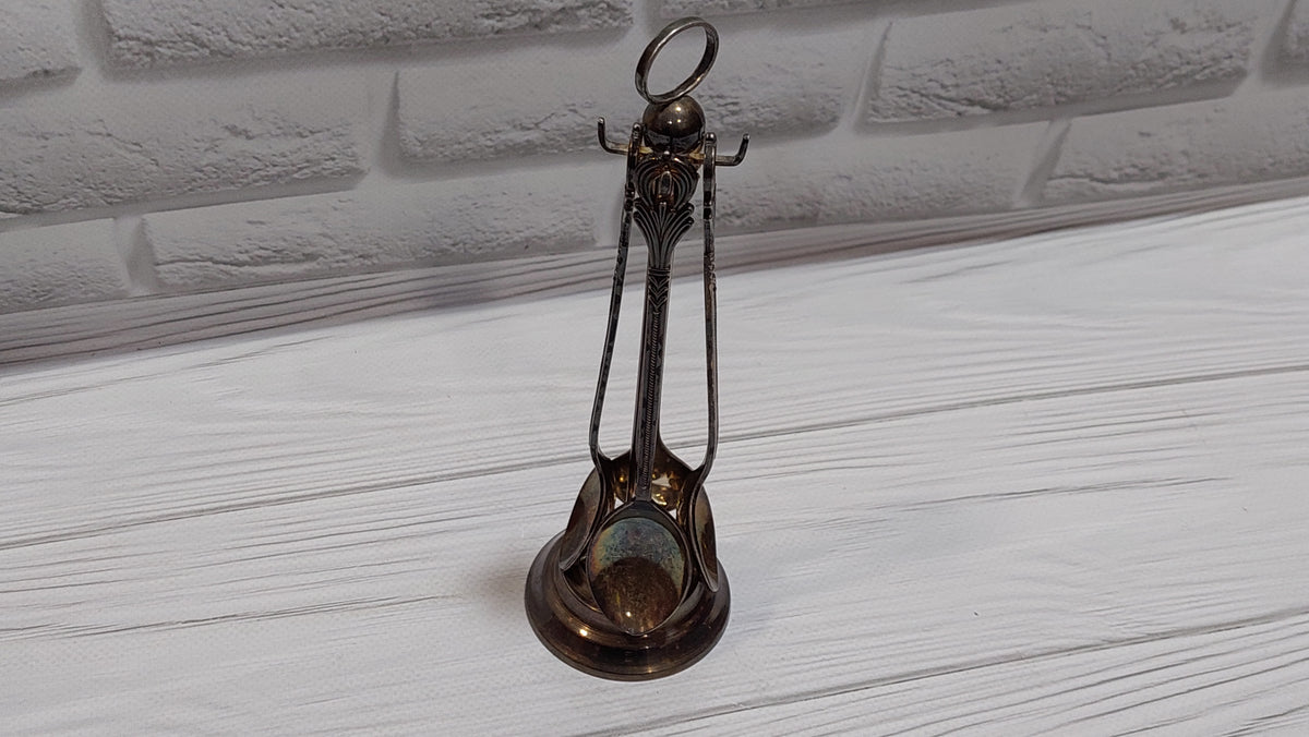 Vintage 4 spoons on a stand, silver plated. New spoons.