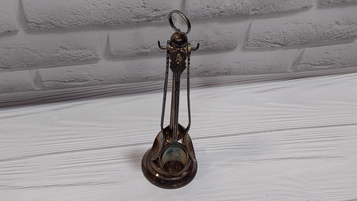 Vintage 4 spoons on a stand, silver plated. New spoons.