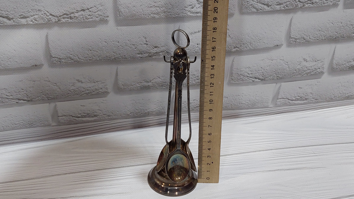 Vintage 4 spoons on a stand, silver plated. New spoons.
