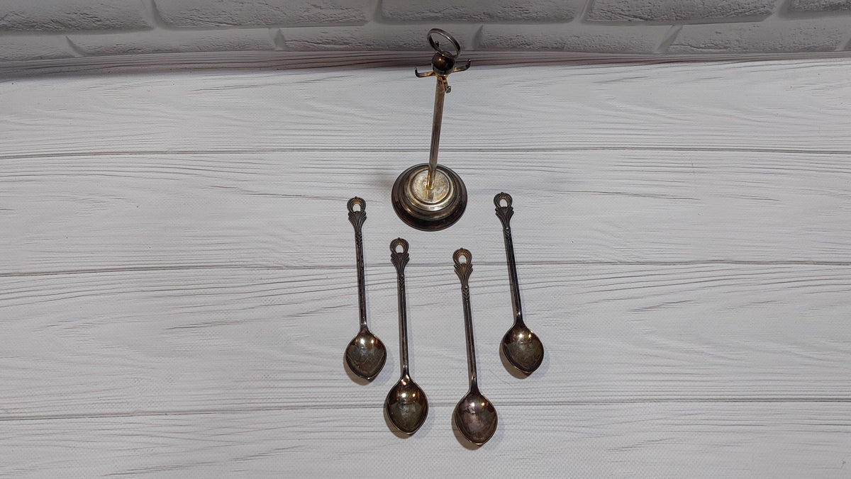 Vintage 4 spoons on a stand, silver plated. New spoons.