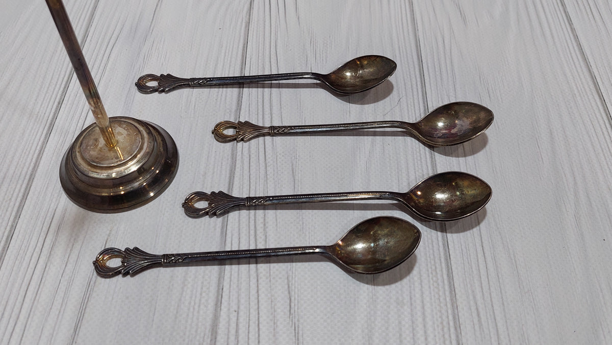 Vintage 4 spoons on a stand, silver plated. New spoons.