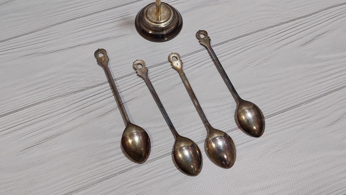 Vintage 4 spoons on a stand, silver plated. New spoons.