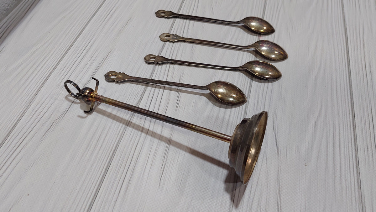 Vintage 4 spoons on a stand, silver plated. New spoons.