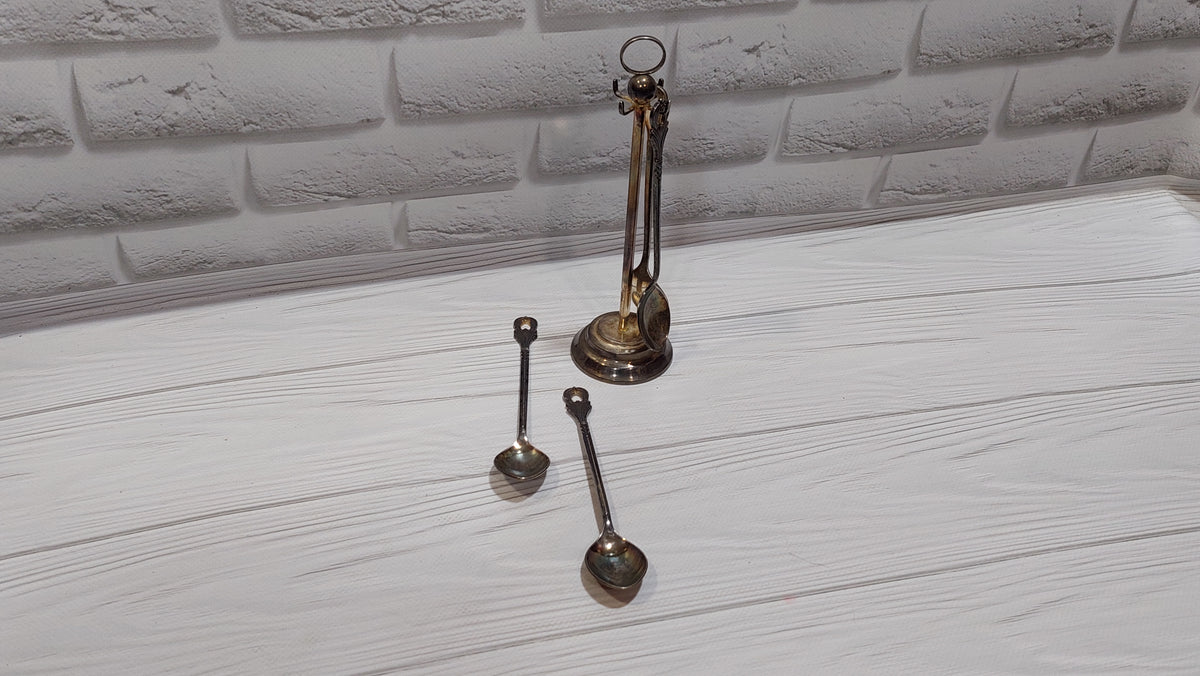 Vintage 4 spoons on a stand, silver plated. New spoons.