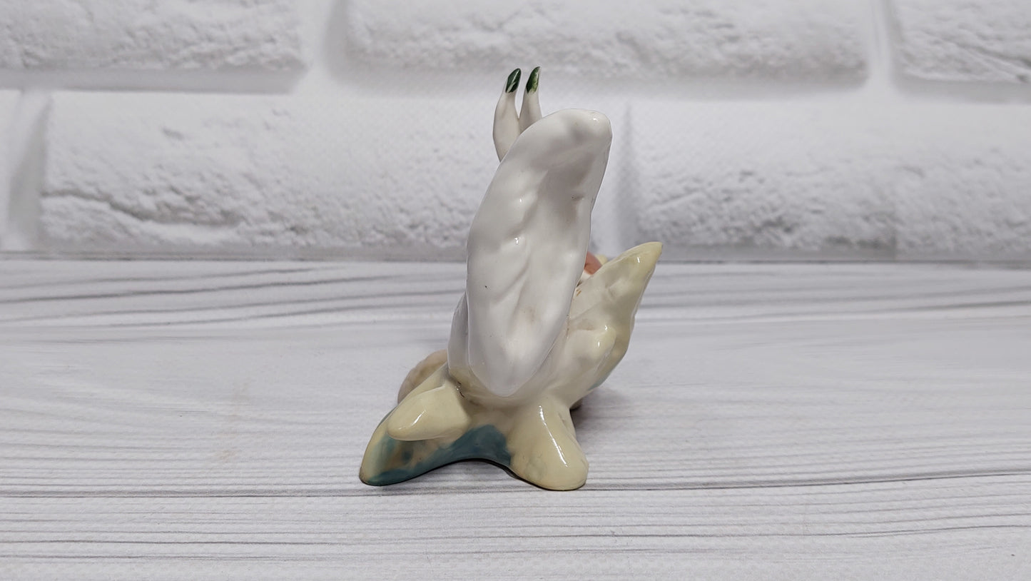 Soviet figurine of a squirrel with a spring mushroom. GORODNITSA.