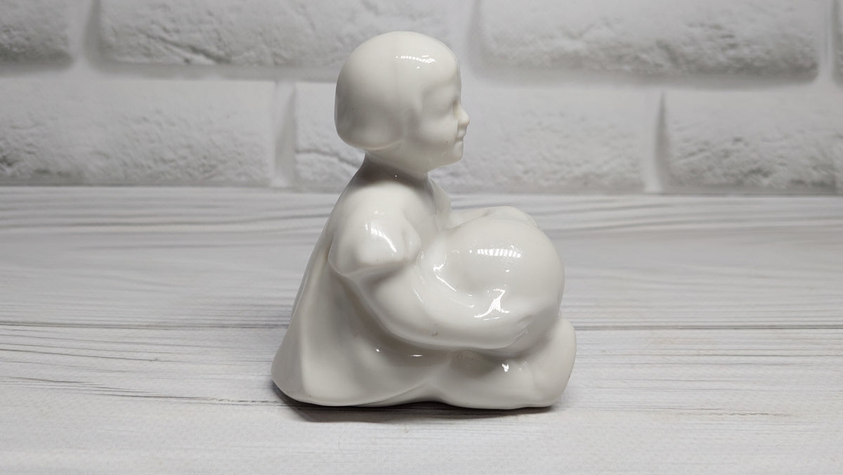 Porcelain figurine of a girl with a ball Antique porcelain figurine children's  porcelain Gorodnitsa Collectible figurine