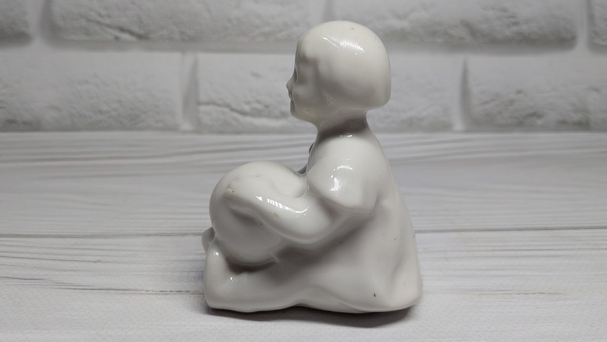 Porcelain figurine of a girl with a ball Antique porcelain figurine children's  porcelain Gorodnitsa Collectible figurine