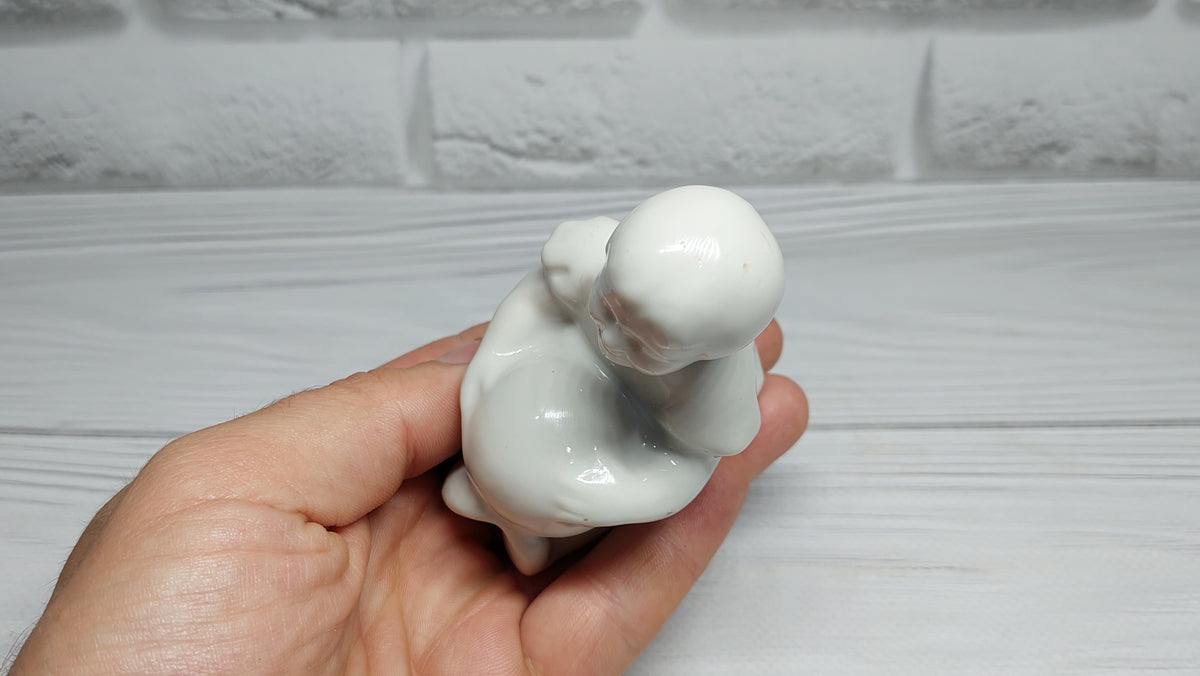 Porcelain figurine of a girl with a ball Antique porcelain figurine children's  porcelain Gorodnitsa Collectible figurine
