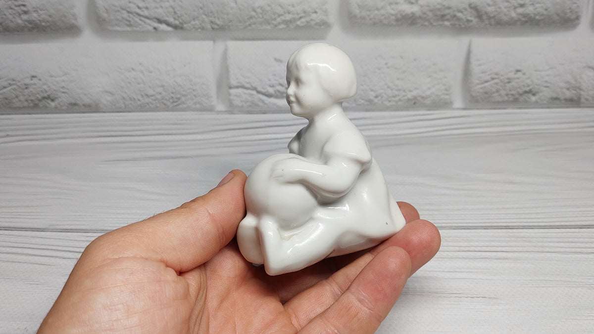 Porcelain figurine of a girl with a ball Antique porcelain figurine children's  porcelain Gorodnitsa Collectible figurine