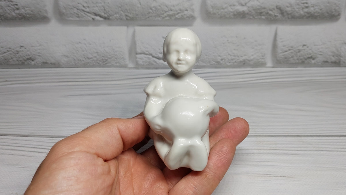 Porcelain figurine of a girl with a ball Antique porcelain figurine children's  porcelain Gorodnitsa Collectible figurine