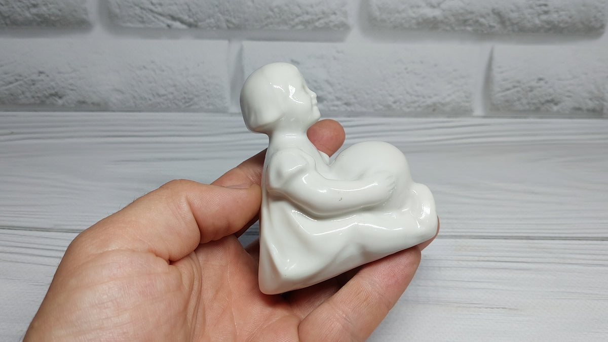 Porcelain figurine of a girl with a ball Antique porcelain figurine children's  porcelain Gorodnitsa Collectible figurine