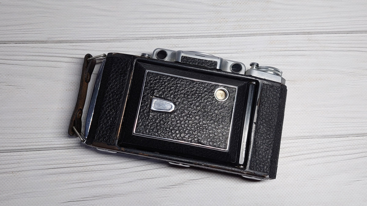 Vintage collectible Moscow-4 (Moskva) Soviet folding film photo camera