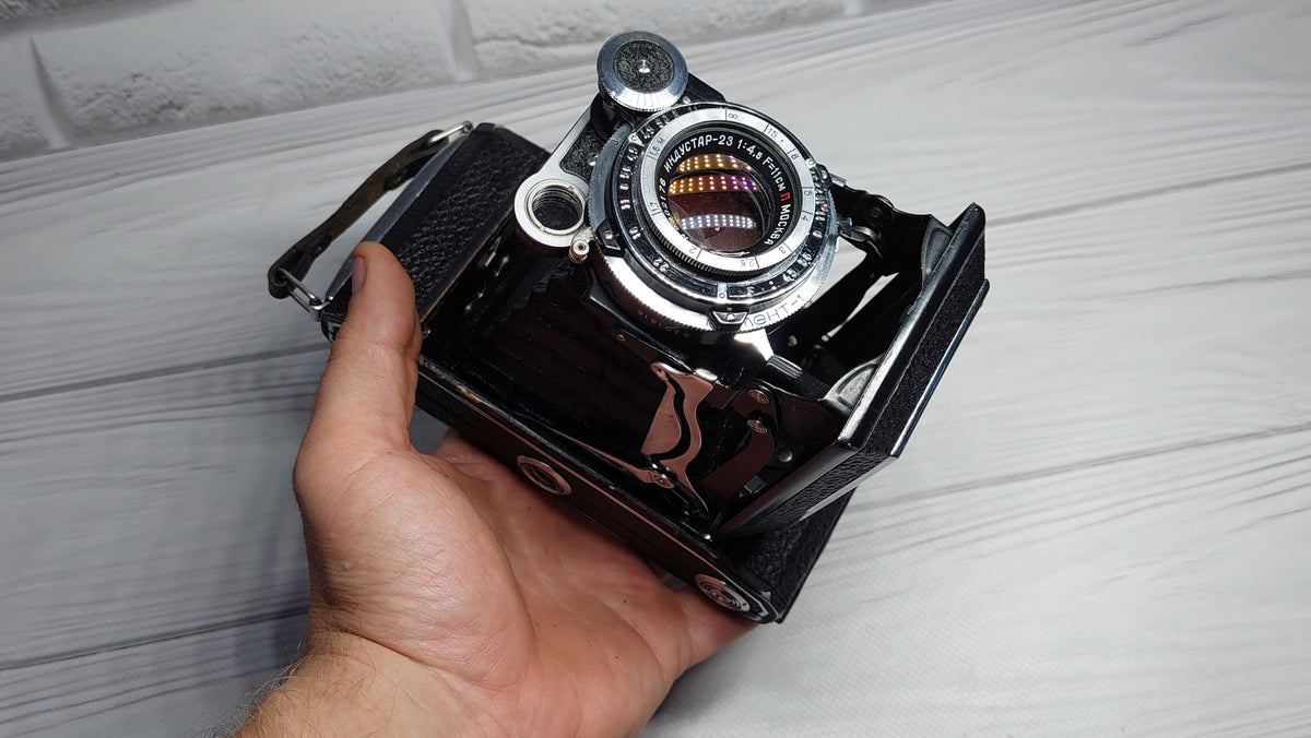 Vintage collectible Moscow-4 (Moskva) Soviet folding film photo camera
