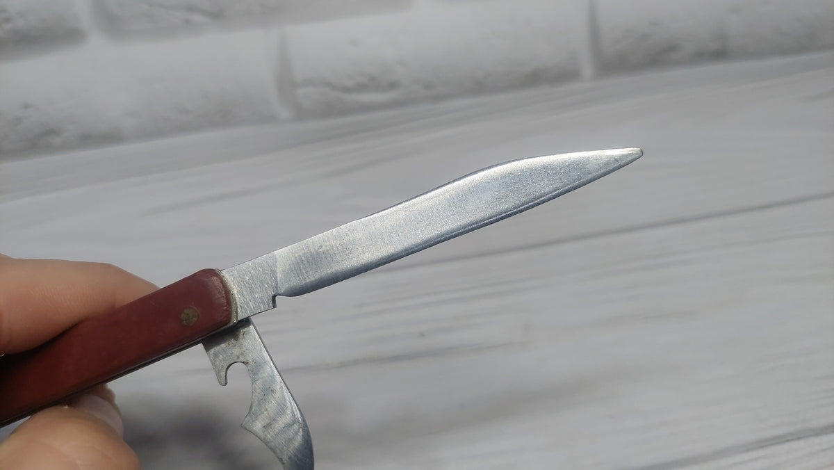Multitool opener soviet knife Metalist Kharkov folding knife opener made in the USSR.