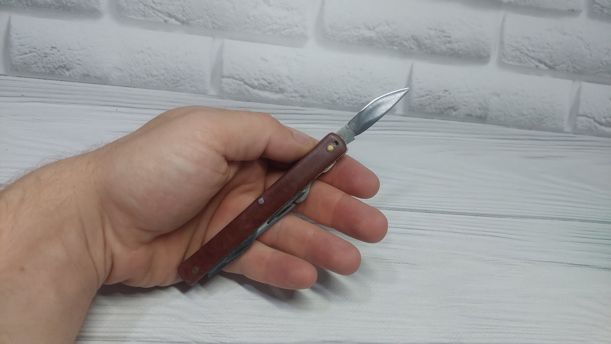 Multitool opener soviet knife Metalist Kharkov folding knife opener made in the USSR.
