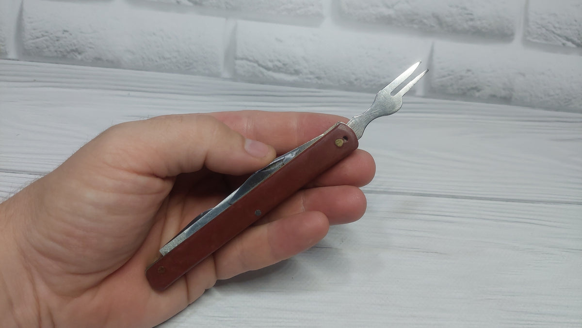 Multitool opener soviet knife Metalist Kharkov folding knife opener made in the USSR.