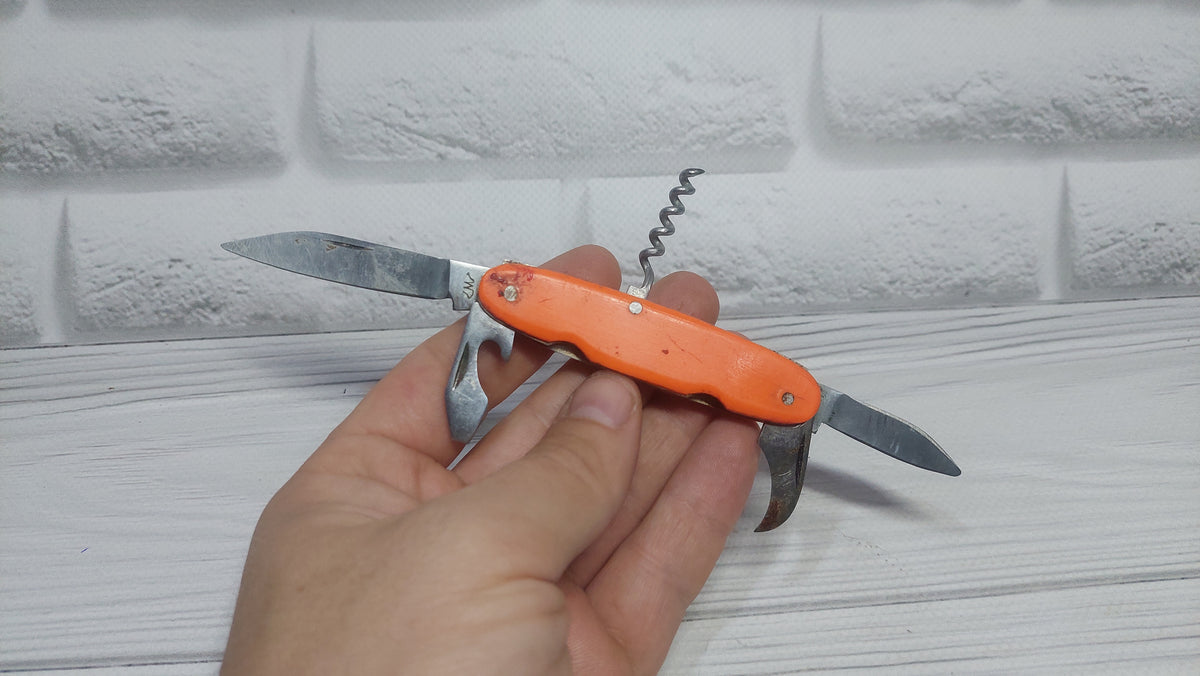 Multitool opener soviet knife Metalist Kharkov folding knife opener made in the USSR.