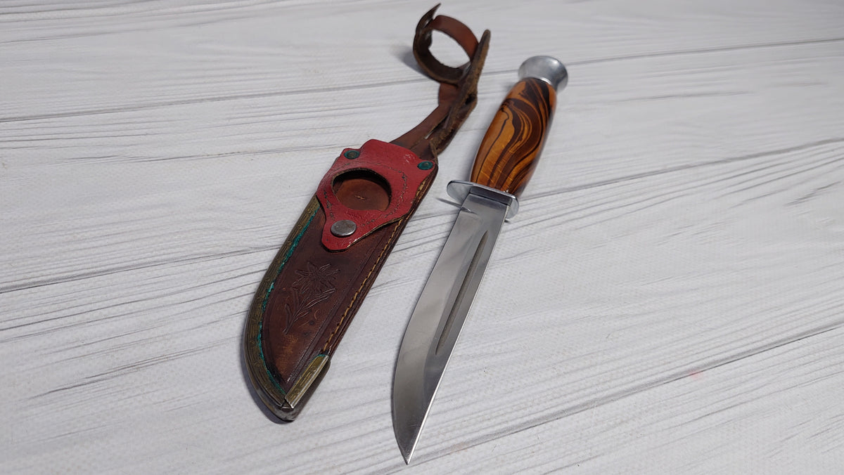 Vintage knife with a compass in the handle. Knife for a boy made in the GDR.