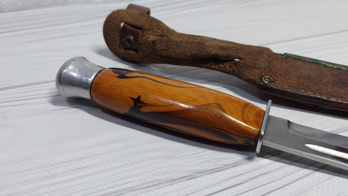 Vintage knife with a compass in the handle. Knife for a boy made in the GDR.