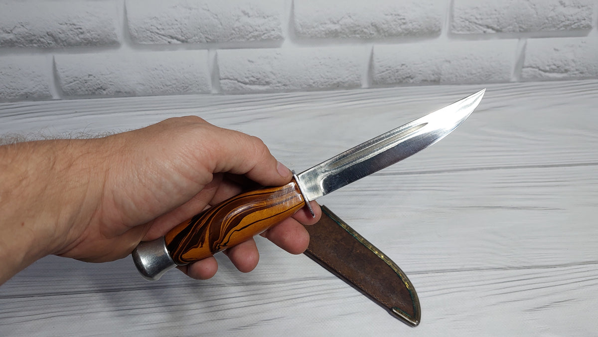Vintage knife with a compass in the handle. Knife for a boy made in the GDR.
