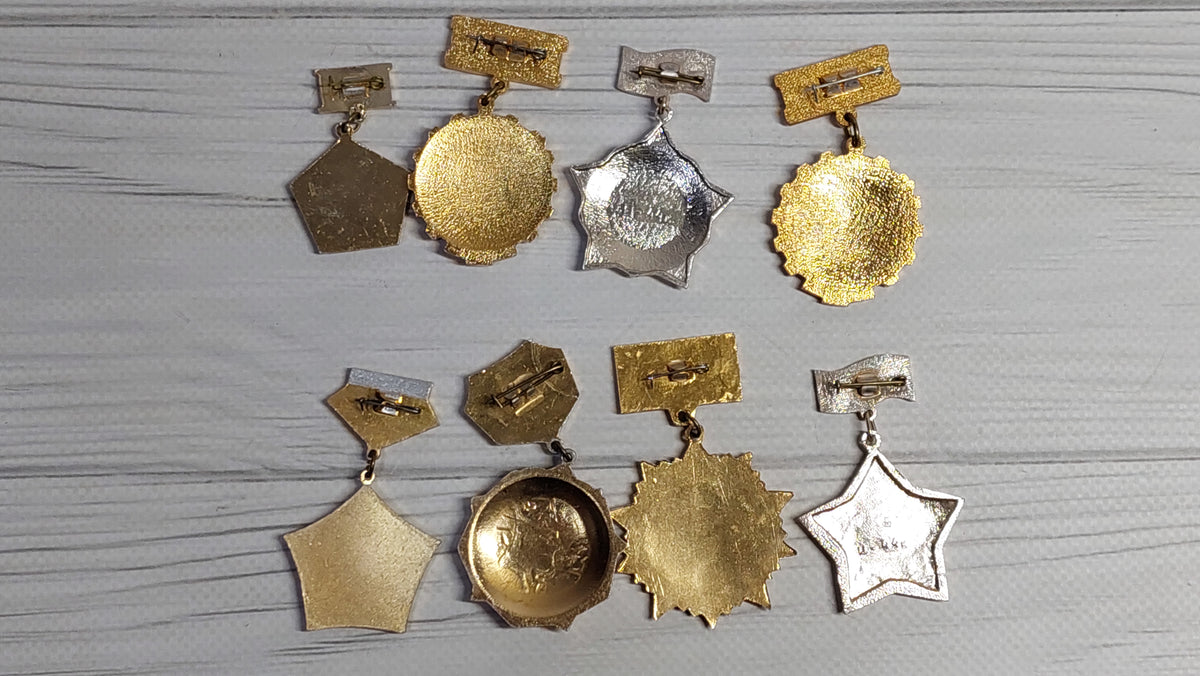 Collection of eight Soviet pin badges, USSR badges of the seventies.