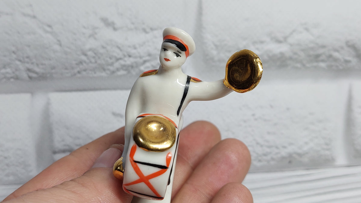 Porcelain figurine musician Suvorov cadet.