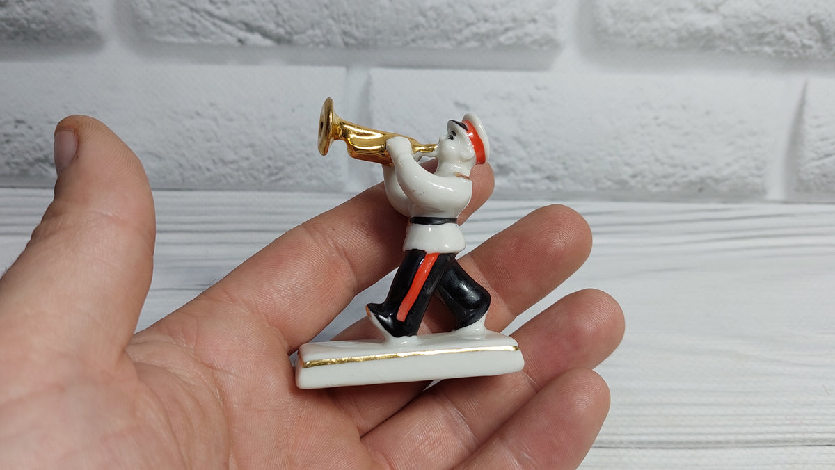 Porcelain figurine musician Suvorov cadet.