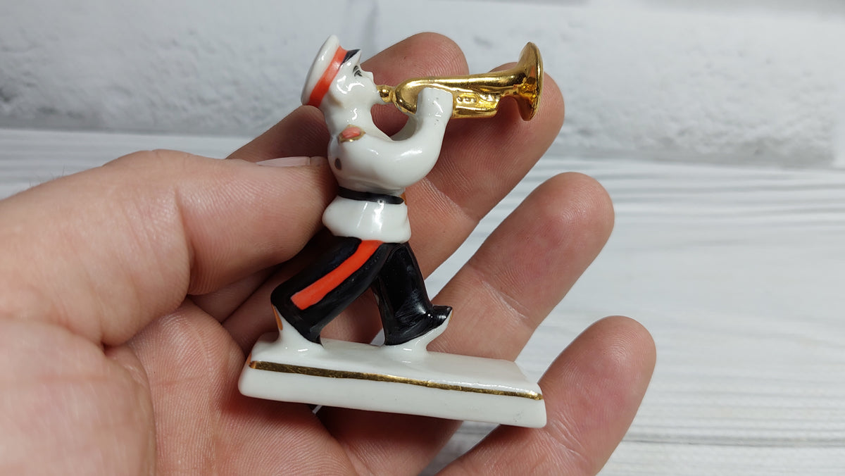Porcelain figurine musician Suvorov cadet.