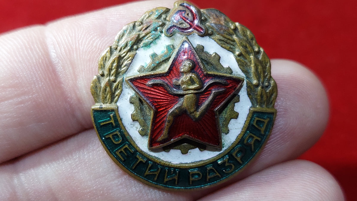 badge of the third category on the run.