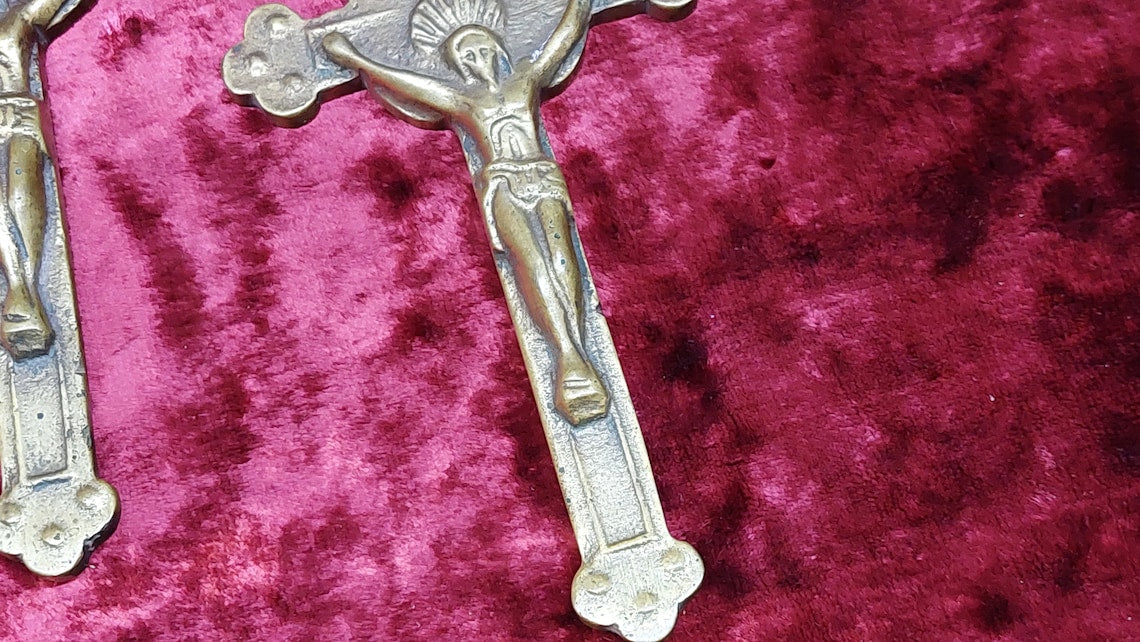 2 brass Catholic crosses