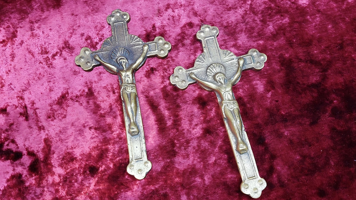 2 brass Catholic crosses