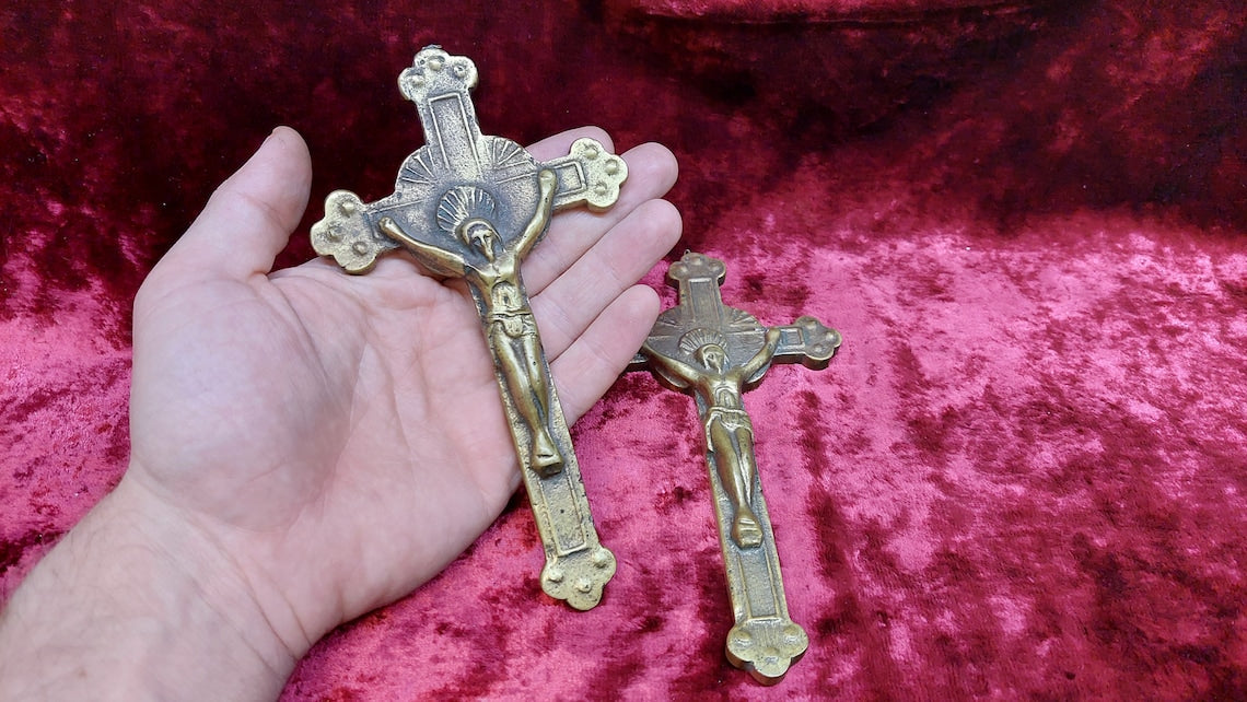 2 brass Catholic crosses