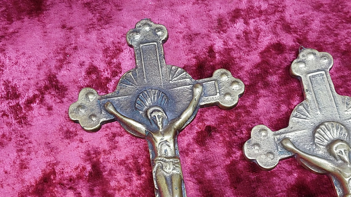 2 brass Catholic crosses
