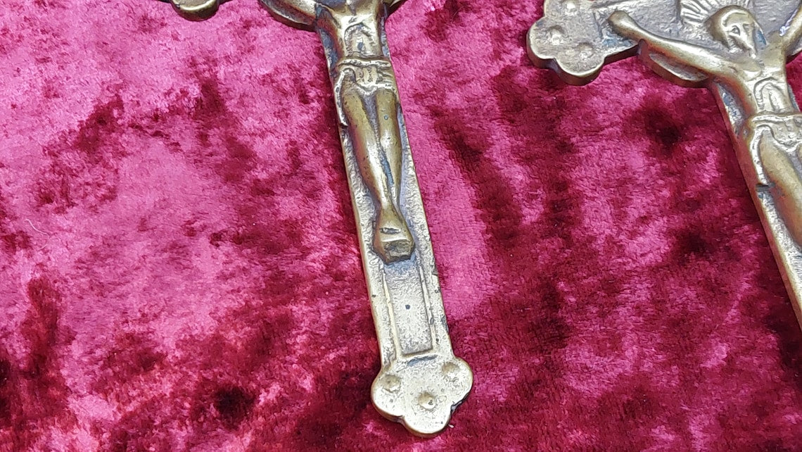 2 brass Catholic crosses