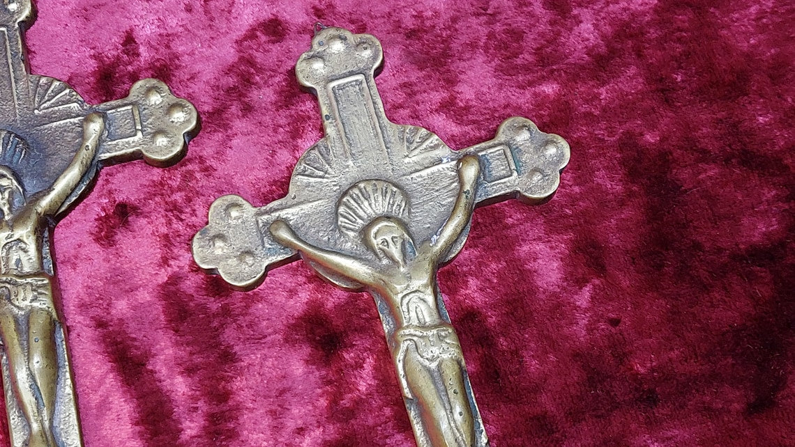 2 brass Catholic crosses
