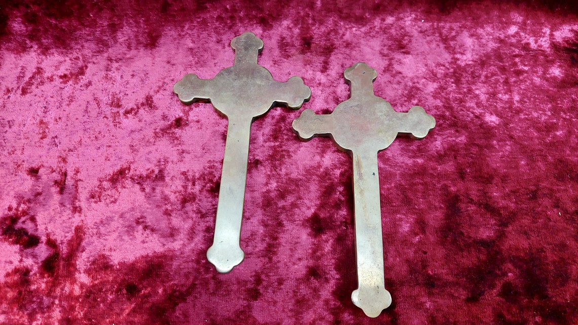 2 brass Catholic crosses
