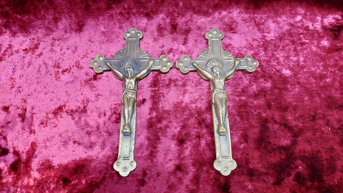 2 brass Catholic crosses
